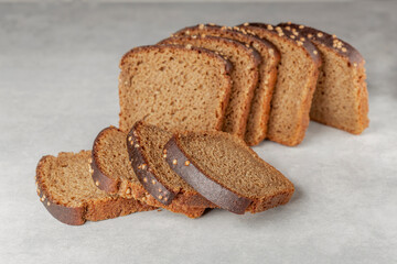 sliced rye bread with coriander grains on the table