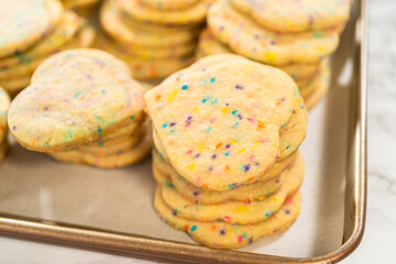 Packing Sprinkle-Adorned Sugar Cookies into Boxes