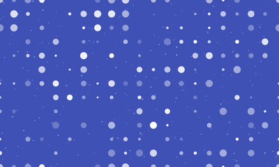 Seamless background pattern of evenly spaced white decagon symbols of different sizes and opacity. Vector illustration on indigo background with stars