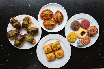 Table scene of assorted take out or delivery foods. Traditional Turkish cuisine. Various Turkish meal and appetizers. Top down view on a table.