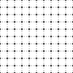 Square seamless background pattern from black car wheel symbols are different sizes and opacity. The pattern is evenly filled. Vector illustration on white background