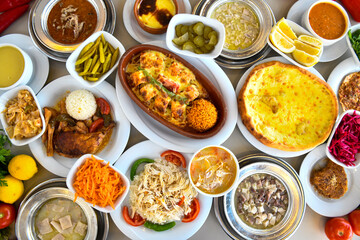 Fototapeta na wymiar Table scene of assorted take out or delivery foods. Traditional Turkish cuisine. Various Turkish meal and appetizers. Top down view on a table.