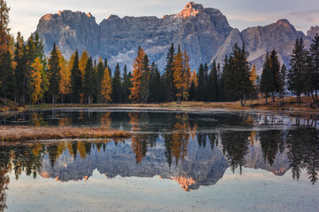 Sunrise at Antorno lake with high Sorapis mountains group in background, Dolomites
