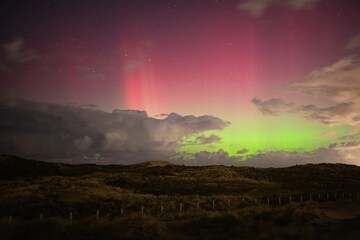 Colorful northern lights seen from the Dutch coast