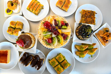 Table scene of assorted take out or delivery foods. Traditional Turkish cuisine. Various Turkish meal and appetizers. Top down view on a table.