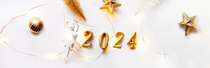 Numbers of year 2024 from voluminous gold numerals on a white background. New Year. Dancing...