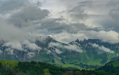 Fototapeta premium clouds over the mountains
