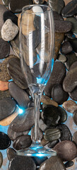 glass of champagne on stone background