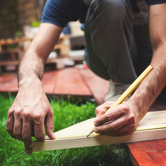 Measuring the board for the deck