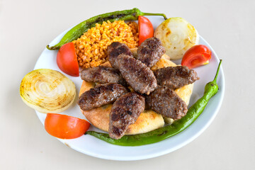 Meatball between bread (Turkish name : ekmek arasi kofte ). Izgara kofte