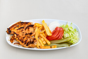 Chicken wings barbeque in a dish with BBQ grill sauce . Izgara tavuk kelebek sis kanat. Tavuk sis, gogus.