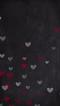 heart doodles chalk on blackboard vertical social media story 4k animation ,hearts scribble on blackboard love and valentine design element
