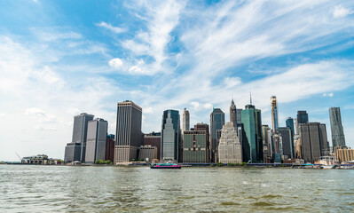 Obraz premium modern skyscraper building in midtown. city skyscraper of manhattan. skyscraper skyline of manhattan. cityscape skyline. new york city. new york downtown architecture. symbol of NYC