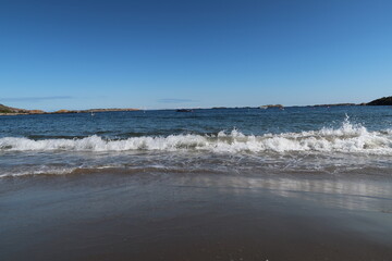 Waves breaking on the beach