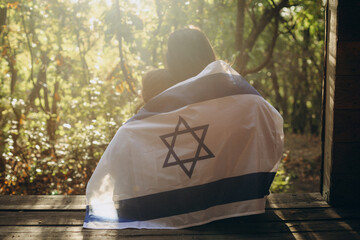 Sisterly Serenity: Embracing Israel's Flag Together - 674065436