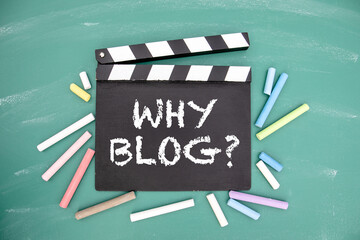 Why Blog. Movie clapper and colored pieces of chalk - obrazy, fototapety, plakaty
