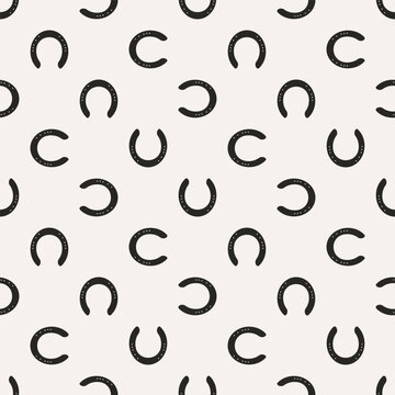 Simple modern vector pattern with horseshoes