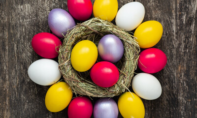 painted Easter eggs, hidden sweets in one, Happy Easter banner, background, card.	