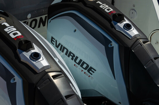 Ayvalyk, TURKEY - September 29, 2022: Couple of outboard motors BRP Evinrude.