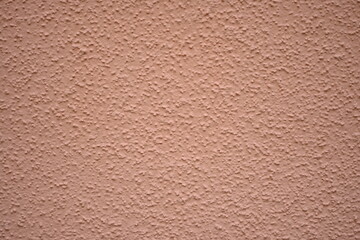 texture of putty painted orange gently pastel painted wall pastel plaster background, pastel pink...