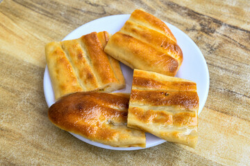 Kiymali pide.Turkish pide with minced meat. Turkish pizza mince pita Pide on white background. Etli ekmek. Kusbasi kasarli, kiymali kasarli, kiymali yumurtali,  tirnak Trabzon, Bafra, Kusbasili pide.