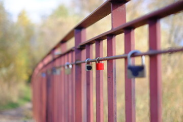 Fototapeta na wymiar red fence with a fence