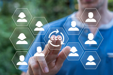 Man using virtual touch interface presses text: ECO. Environmental ecology technology concept. Sustainable development goals. SDGs. Green Computing, Green Technology, Green IT, CSR and IT ethics.