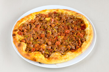 Kiymali pide.Turkish pide with minced meat. Turkish pizza mince pita Pide on white background. Etli ekmek. Kusbasi kasarli, kiymali kasarli, kiymali yumurtali,  tirnak Trabzon, Bafra, Kusbasili pide.