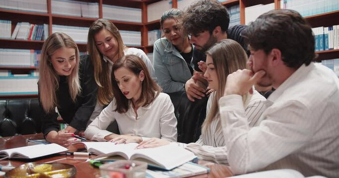 This scene embodies the essence of the university education concept, where knowledge sharing, academic guidance, and collaboration intertwine. The students seek guidance on their studies, academic