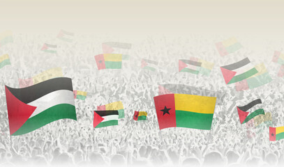 Palestine and Guinea-Bissau flags in a crowd of cheering people.
