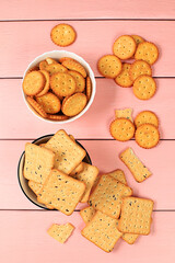 Dry french cracker with sesame seeds on wooden background.Homemade chocolate chip cookies with gluten free nuts,modern bakery concept. Healthy breakfast with ingredients, top view,