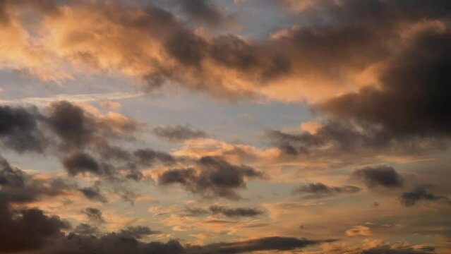 Dramatic dusk clouds rolling overhead.
Fast moving evening cloudscape.