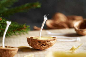 Handmade Christmas candles made of bees wax and walnut shells