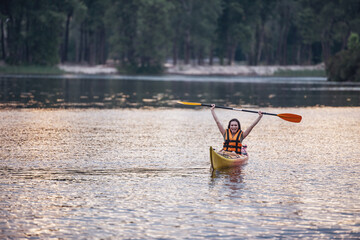 Woman and kayak