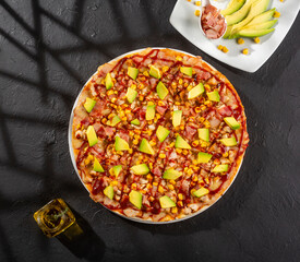 BBQ chicken pizza - Neapolitan sauce and cheese base. Fusion of chicken, bacon, corn, avocado with BBQ sauce