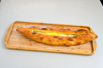 Kiymali pide.Turkish pide with minced meat. Turkish pizza mince pita Pide on white background. Etli ekmek. Kusbasi kasarli, kiymali kasarli, kiymali yumurtali,  tirnak Trabzon, Bafra, Kusbasili pide.