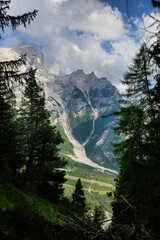 waterfall in forest, photo as a background , in dolomites mountains, autumn in italy - 674136283