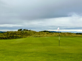 Fototapeta premium St Andrews, Scotland - September 22, 2023: Landscape views of the Jubilee Golf Course, a public course in St Andrews Scotland 