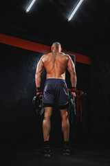 Fototapeta na wymiar Man Getting Ready To Weight Training At The Gym