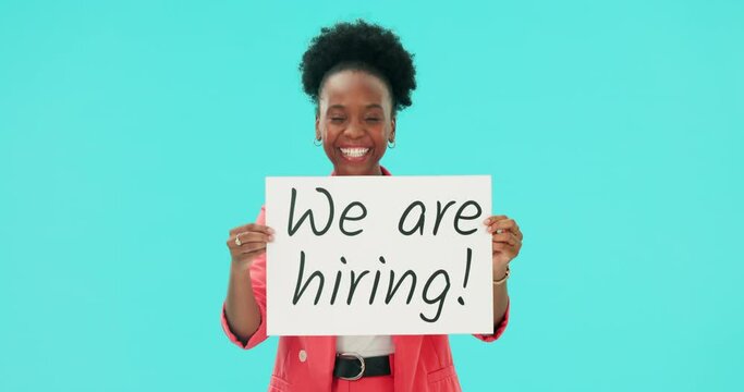 African woman, sign and poster in studio, face and human resources for recruitment by blue background. Manager, hr expert and paper billboard for we are hiring drive, onboarding and welcome to agency