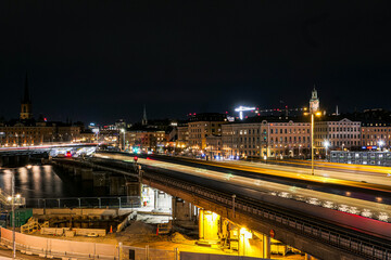 Fototapeta na wymiar High angle view of illuminated bridge over river at night