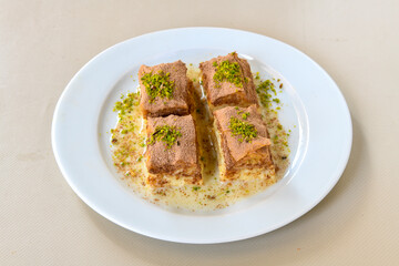 Turkish Dessert Sobiyet  Baklava, mussels baklava and classic baklava with Pistachio . Cevizli, Fistikli Baklava, top view.