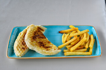 Turkish karisik atom  tost ( kasarli bazlama tost) . Sucuklu, Kasarli, kavurmali karisik tost. Flat...