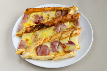 Kiymali pide.Turkish pide with minced meat. Turkish pizza mince pita Pide on white background. Etli ekmek. Kusbasi kasarli, kiymali kasarli, kiymali yumurtali,  tirnak Trabzon, Bafra, Kusbasili pide.