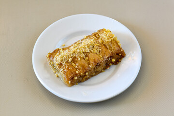Turkish Dessert Sobiyet  Baklava, mussels baklava and classic baklava with Pistachio . Cevizli, Fistikli Baklava, top view.