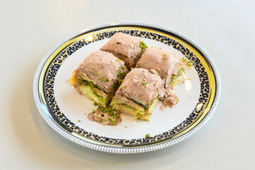 Turkish Dessert Sobiyet  Baklava, mussels baklava and classic baklava with Pistachio . Cevizli, Fistikli Baklava, top view.