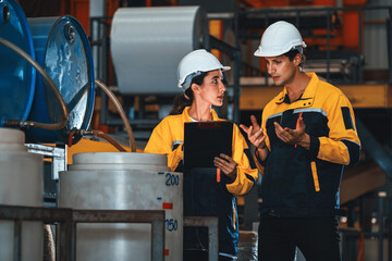 Two factory workers or engineers conduct professional inspection on machine or procedure in chemical plant, chemistry factory workplace and industrial profession concept. Exemplifying - obrazy, fototapety, plakaty