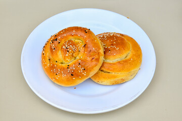 Turkish pastry product , tasty pogaca. Turkish Pastries; pogaca, borek, acma, ay coregi at patisserie showcase.