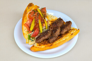 Meatball between bread (Turkish name : ekmek arasi kofte ). Izgara kofte