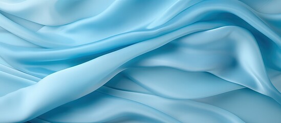 Fototapeta premium Silk fabric of a light blue hue crafted with a textured pattern resembling the color of blue turquoise creating a background that adds depth and visual interest to the overall tone and text